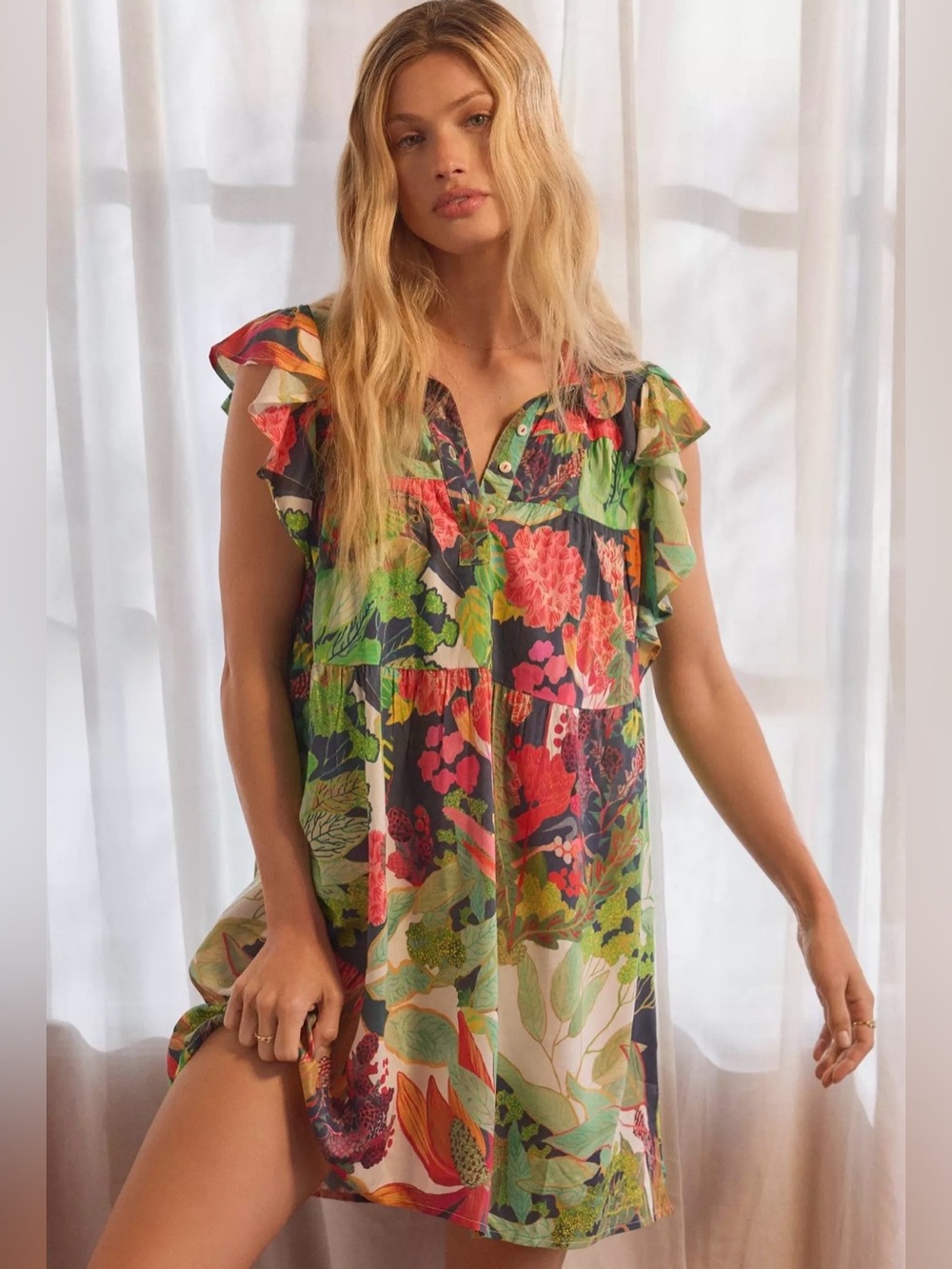 Anthropologie’s Michelle Morin Short Sleeve Popover Mini Dress in Garden Floral